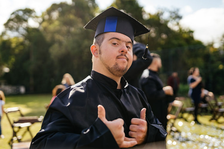 a photo of a graduate with Down's Syndrome