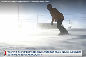 a snowboarder going down a mountain
