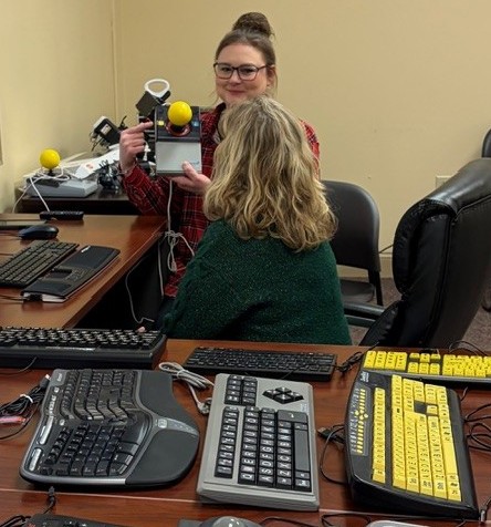 Kacee Givens at her table
